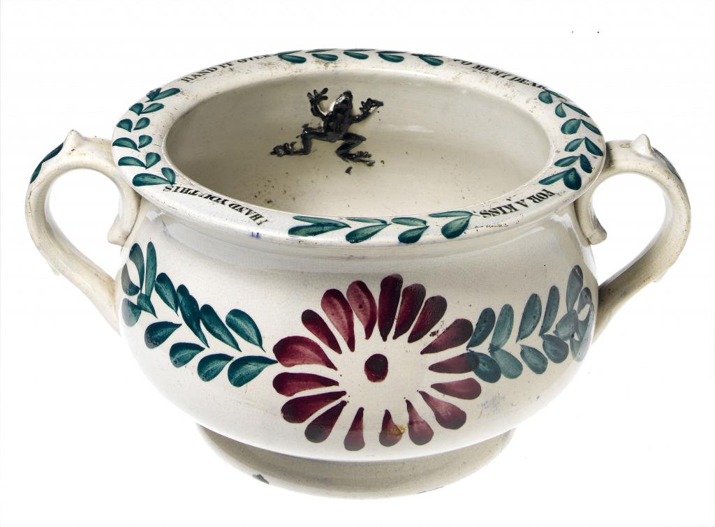 Appraisal: A TWO HANDLED FROG-AND-NEWT CHAMBER POT POSSIBLY SUNDERLAND printed with