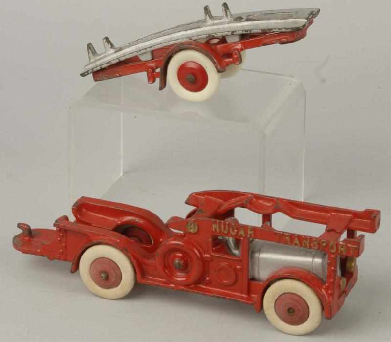 Appraisal: Cast Iron Hubley Nu Car Transport Toy Description Painted red