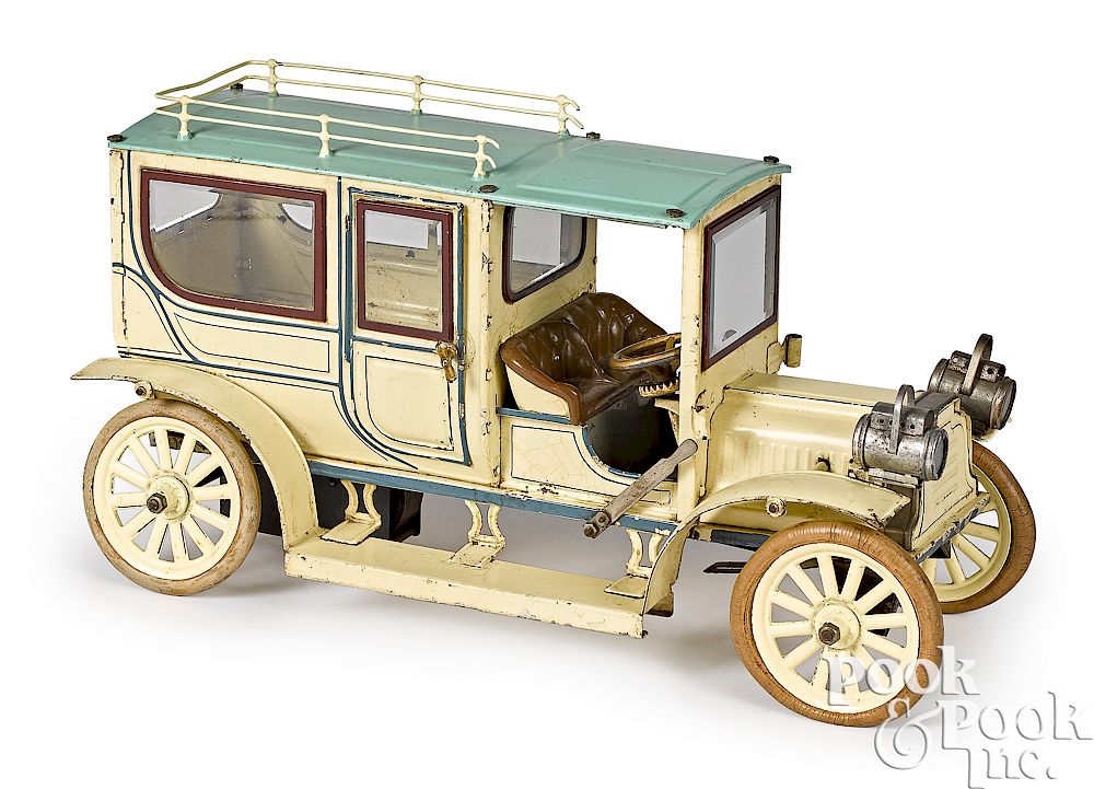 Appraisal: Large Carette tinplate clockwork limousine Large Carette tinplate clockwork limousine