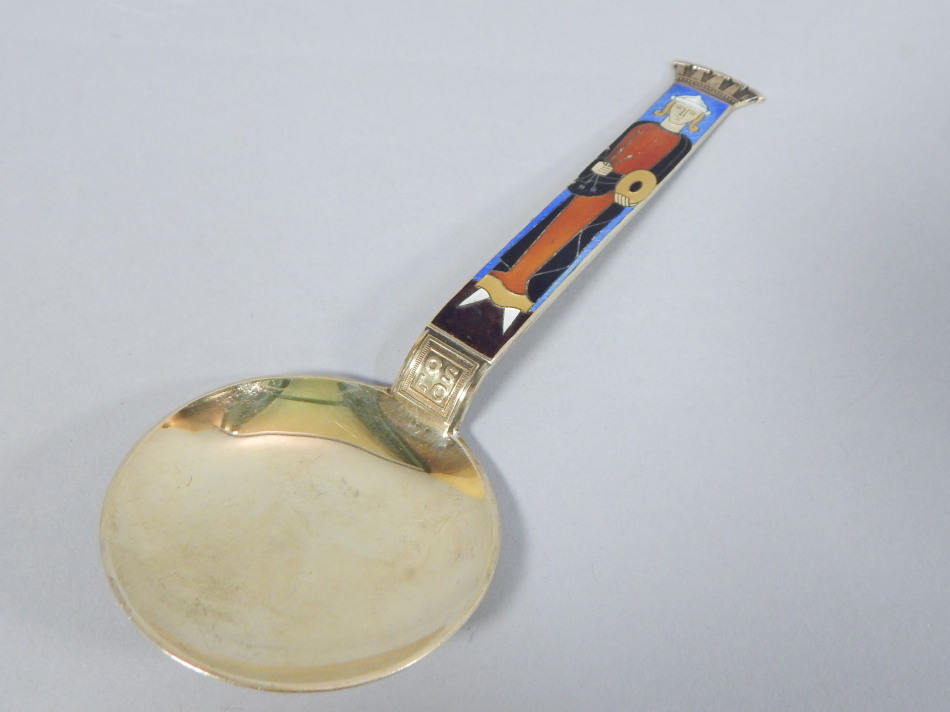 Appraisal: A Norwegian gilt white metal ornamental spoon with an enamel