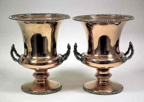 Appraisal: A pair of plated two-handled Campana pattern wine coolers with