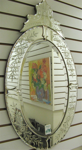 Appraisal: VENETIAN STYLE OVOID-SHAPED WALL MIRROR engraved with floral and prunus