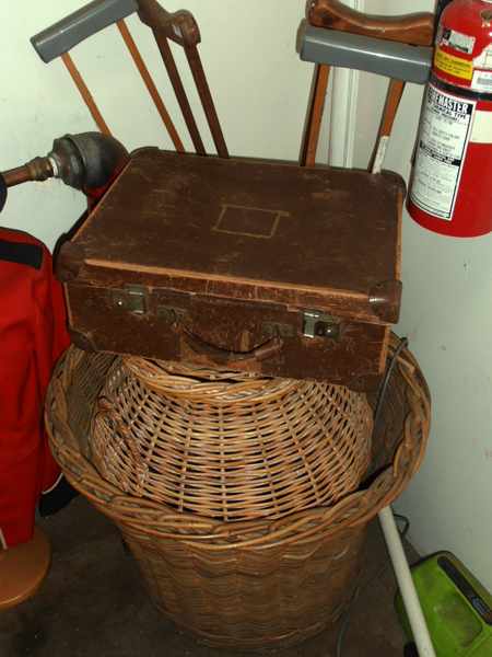 Appraisal: TWO LARGE ANTIQUE CANE BASKETS WITH A COLLECTION OF CRUTCHES