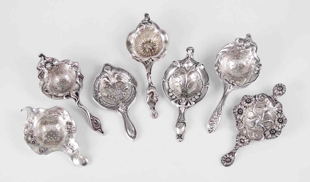 Appraisal: ART NOUVEAU STERLING TEA STRAINERS All with typical art nouveau