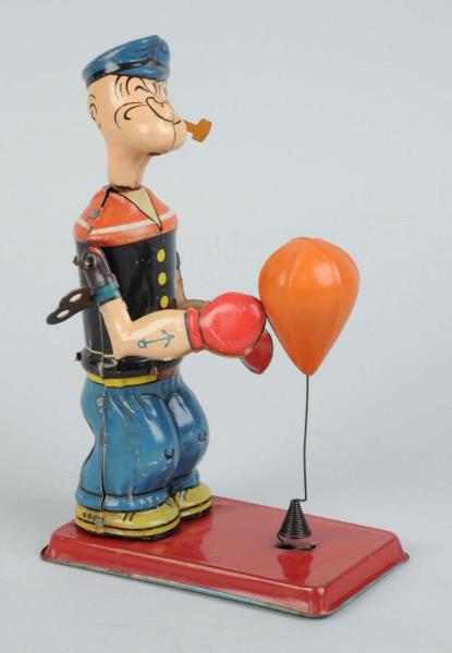 Appraisal: Chein Tin Litho Wind-Up Popeye Floor Punching Toy Much scarcer