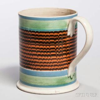 Appraisal: Mocha-decorated Pearlware Quart Mug England c broad herringbone-impressed green-glazed bands