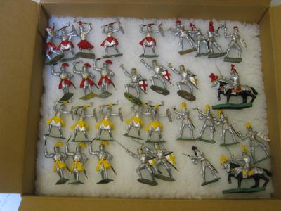 Appraisal: Thirty two plastic Medieval army figures including two mounted knights