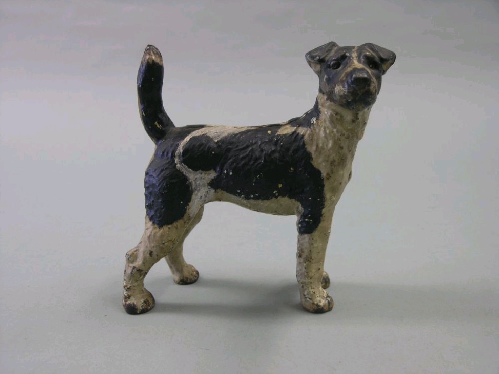 Appraisal: A late Victorian cast iron model of a terrier painted