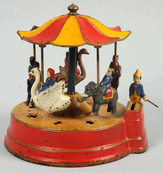 Appraisal: Cast Iron Merry-Go-Round Mechanical Bank Manufactured by Kyser Rex Red