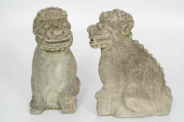 Appraisal: Pair of Chinese Cement Foo Dogs China A pair of