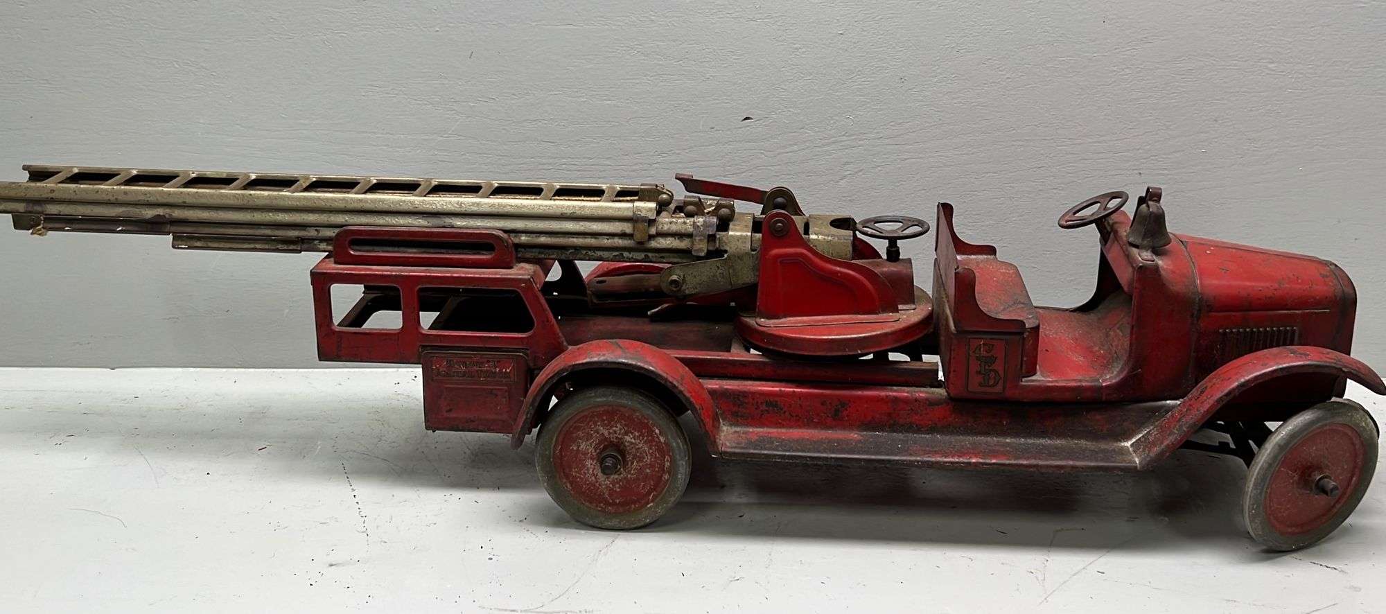 Appraisal: Buddy L Aerial Truck pressed steel fire toyearly th century