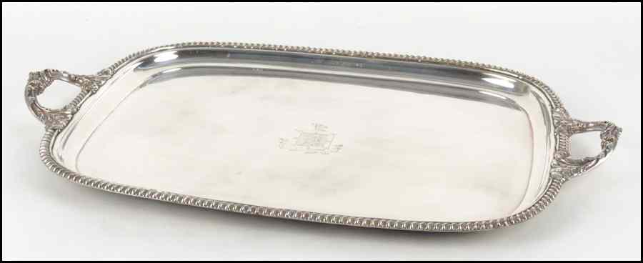 Appraisal: ENGLISH SHEFFIELD SILVERPLATE TWO-HANDLED TRAY Bearing a central engraved crest