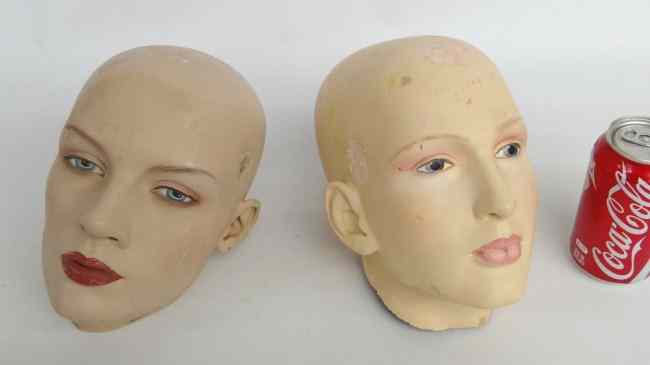 Appraisal: Pair early to mid th c mannequin heads Imperfections