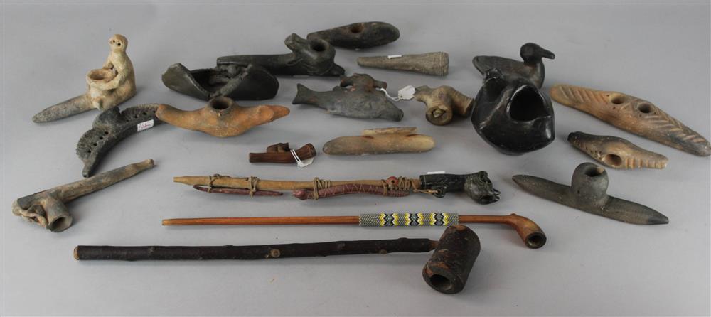 Appraisal: LARGE GROUP OF NATIVE AMERICAN STYLE PIPES AND FIGURES pottery