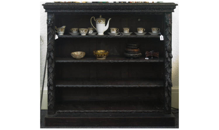 Appraisal: Ebonised Carved Bookcase Containing Three Shelves Height Inches x Inches