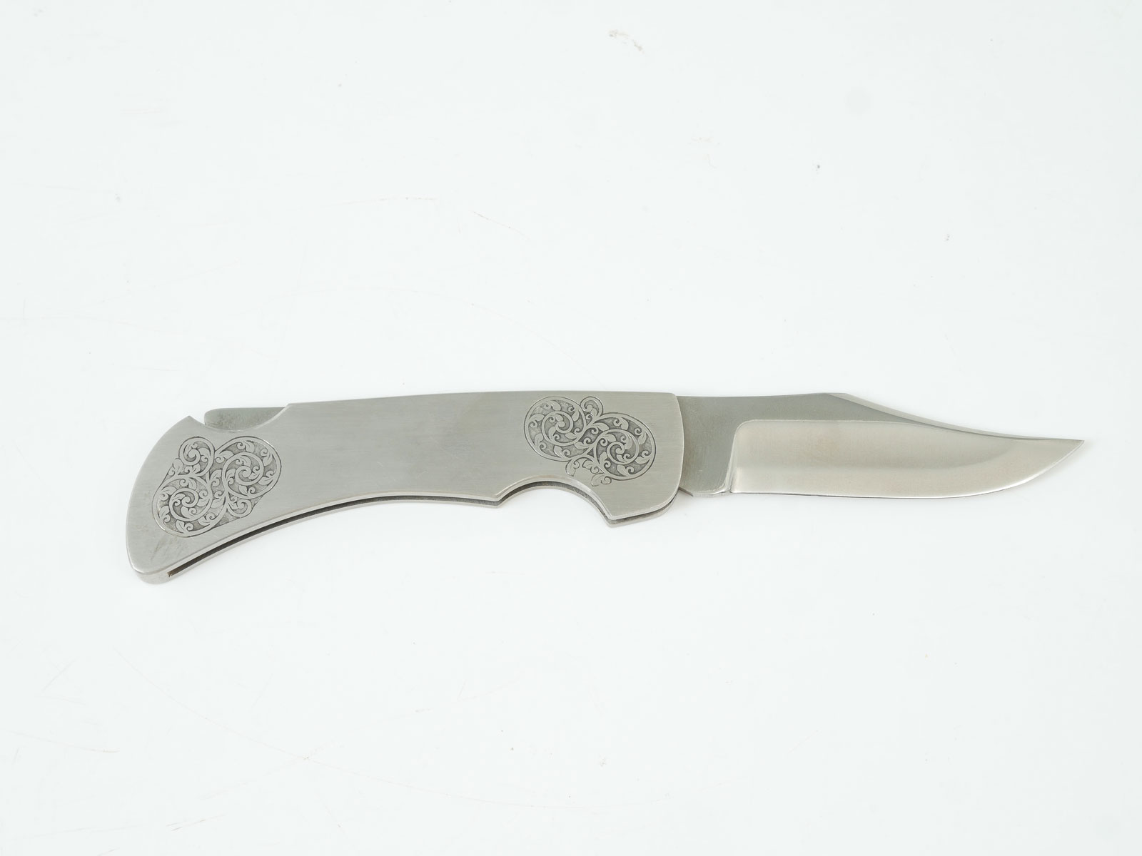 Appraisal: RIGID LOCK BACK HUNTER ENGRAVED STAINLESS STEEL Satin finished stainless