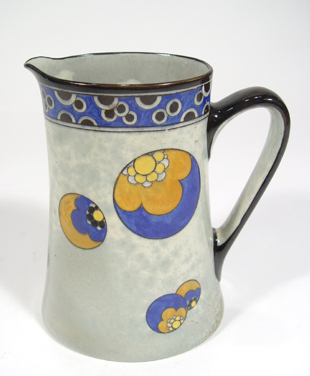 Appraisal: Royal Doulton Titanian pottery jug with hand coloured stylised decoration