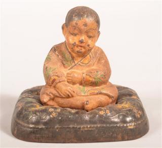 Appraisal: Hubley Oriental Boy on Pillow Still bank Painted Cast Iron