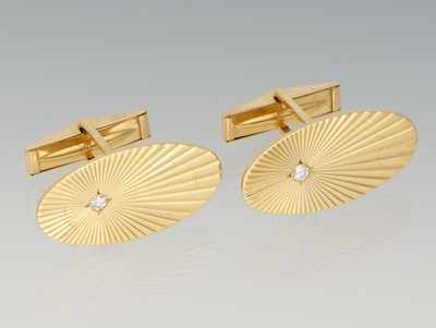 Appraisal: A Pair of Gold and Diamond Cufflinks ca k yellow