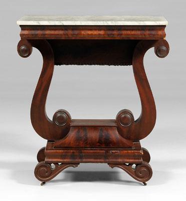 Appraisal: Classical figured mahogany pier table highly figured mahogany veneers with