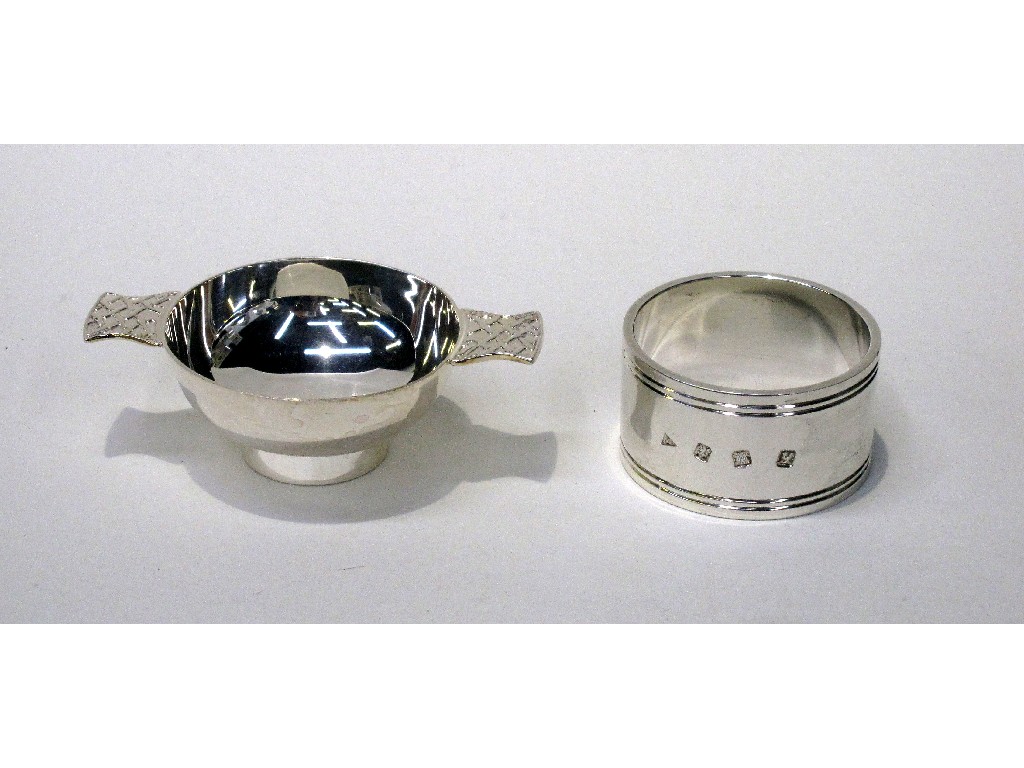 Appraisal: Lot comprising silver napkin ring and a silver quaich Edinburgh