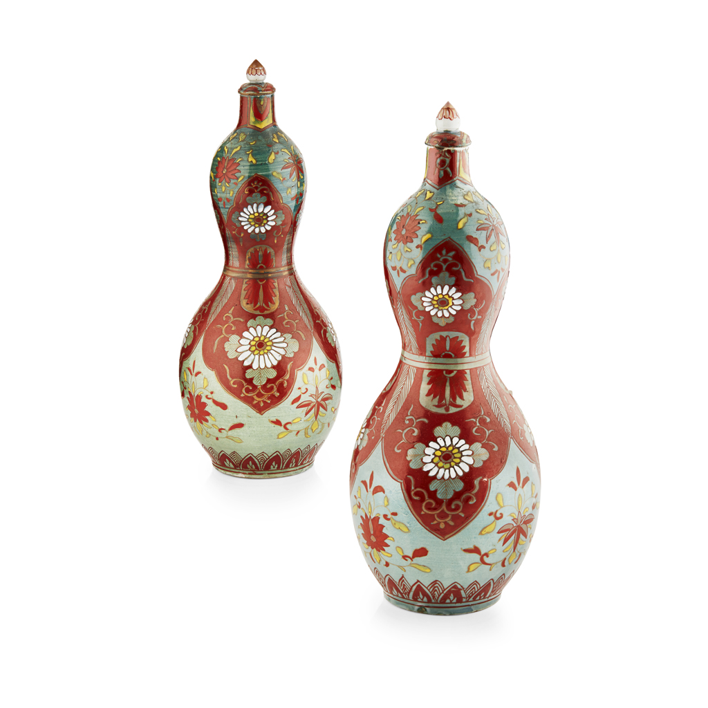 Appraisal: PAIR OF KUTANI DOUBLE-GOURD VASES AND COVERS glazed green and