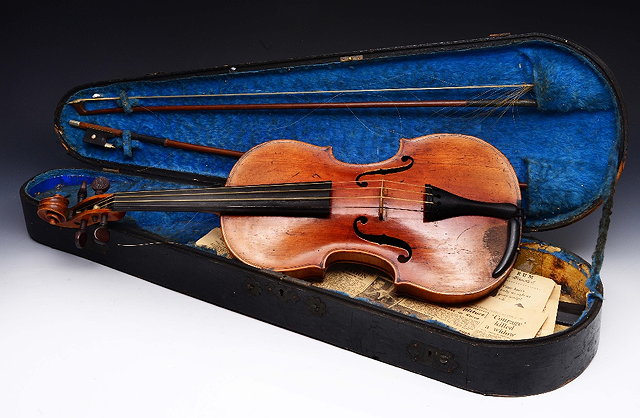 Appraisal: A LATE TH CENTURY CONTINENTAL VIOLIN with two bows in