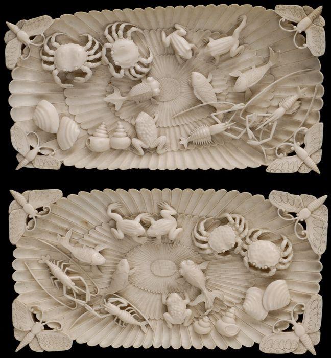 Appraisal: PAIR OF JAPANESE CARVED IVORY RECTANGULAR TRAYS Each chrysanthemum pattern