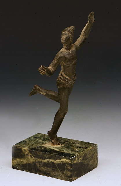 Appraisal: A MINIATURE BRONZE of a dancer after the Antique on