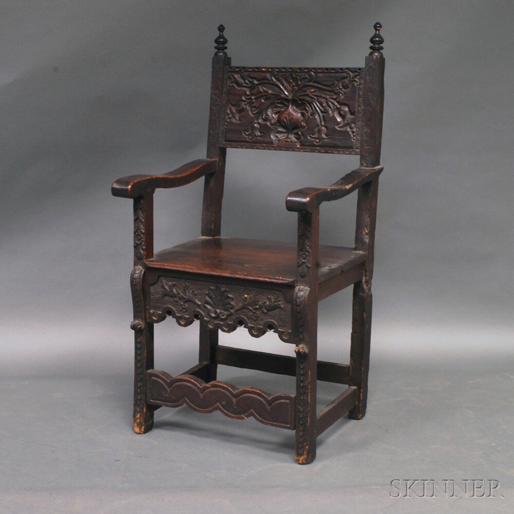 Appraisal: Renaissance Revival Carved Oak Armchair th century with turned finials