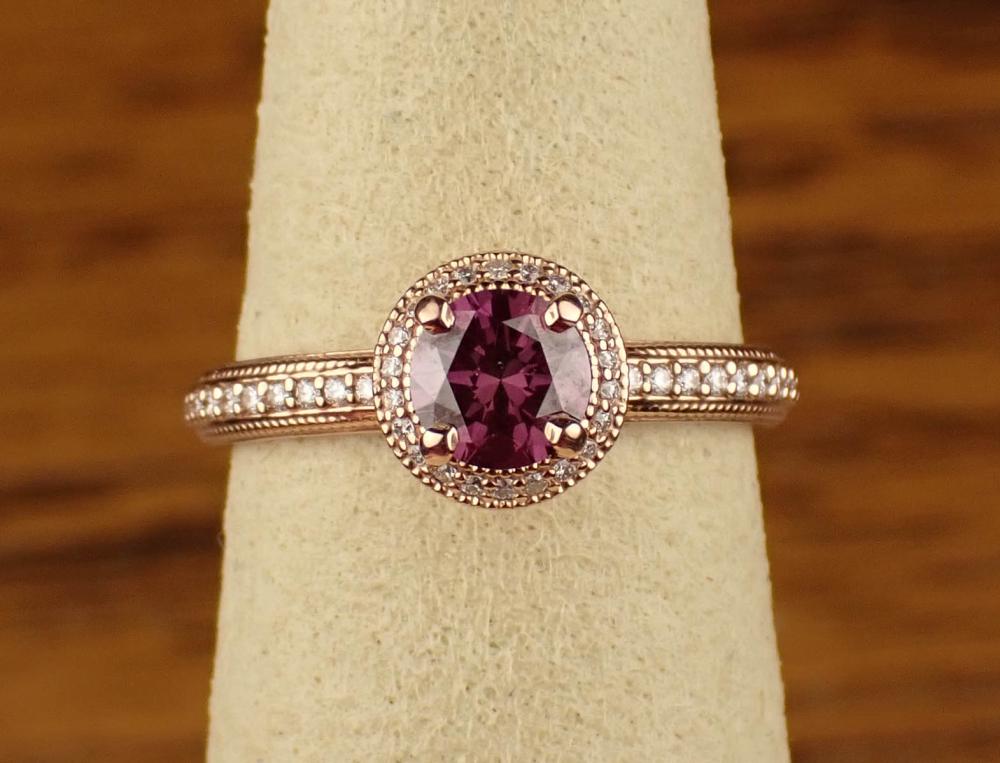 Appraisal: FANCY PURPLISH RED DIAMOND AND ROSE GOLD RING The k