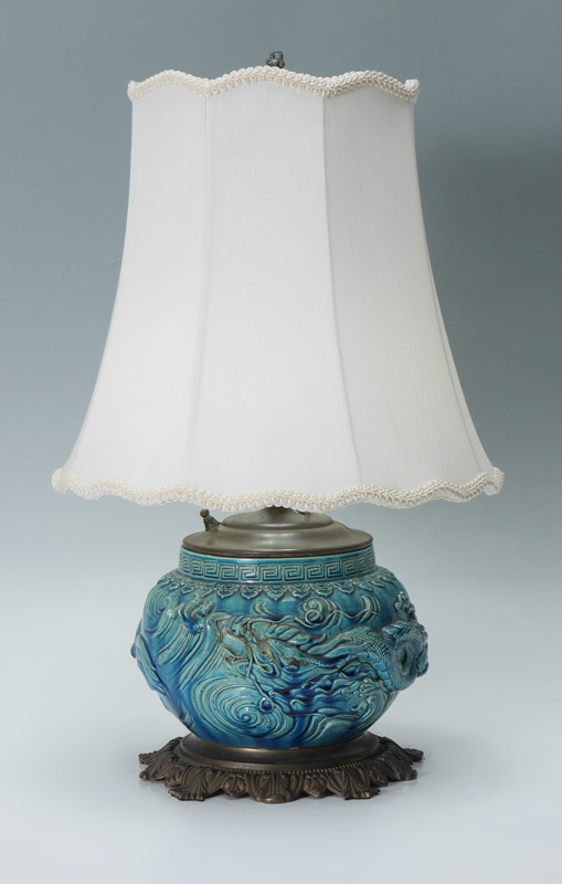 Appraisal: CHINESE BLUE GLAZE DRAGON LAMP Applied figural dragon or sea