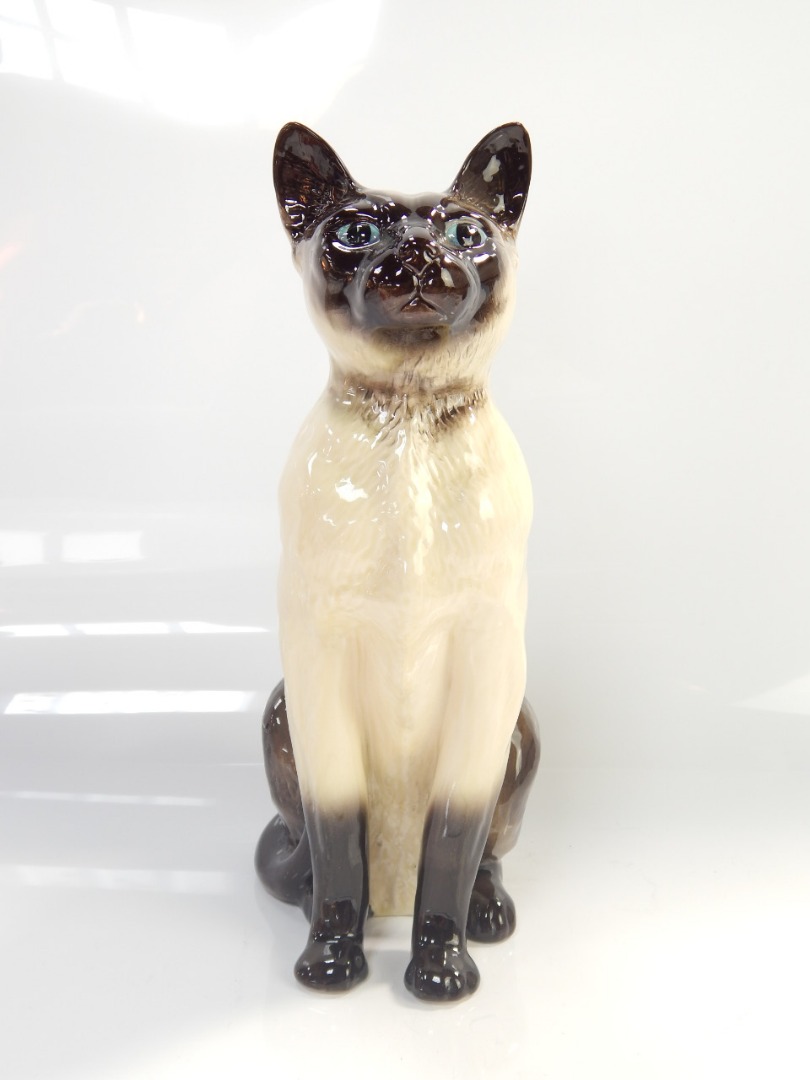 Appraisal: A Beswick Siamese cat in seated position cm high