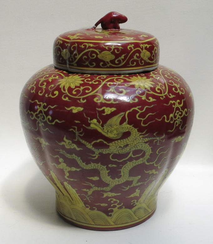 Appraisal: CHINESE PORCELAIN LIDDED JAR with four yellow dragons and cloud