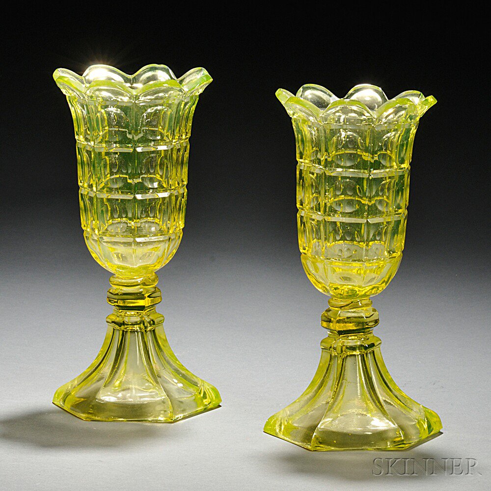 Appraisal: Two Vaseline Pressed Four Printie Block Pattern Glass Vases mid