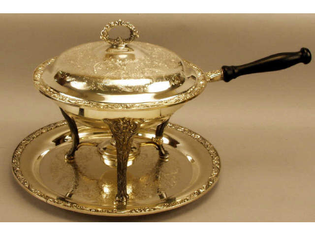 Appraisal: Fine quality silver plated chafing dish with serving tray Estimate