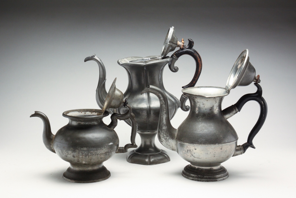 Appraisal: THREE AMERICAN PEWTER TEAPOTS First half th century Sellew Co