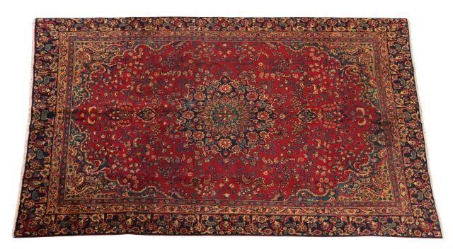 Appraisal: Hand-tied Persian Mashad rug approx ' l ' w