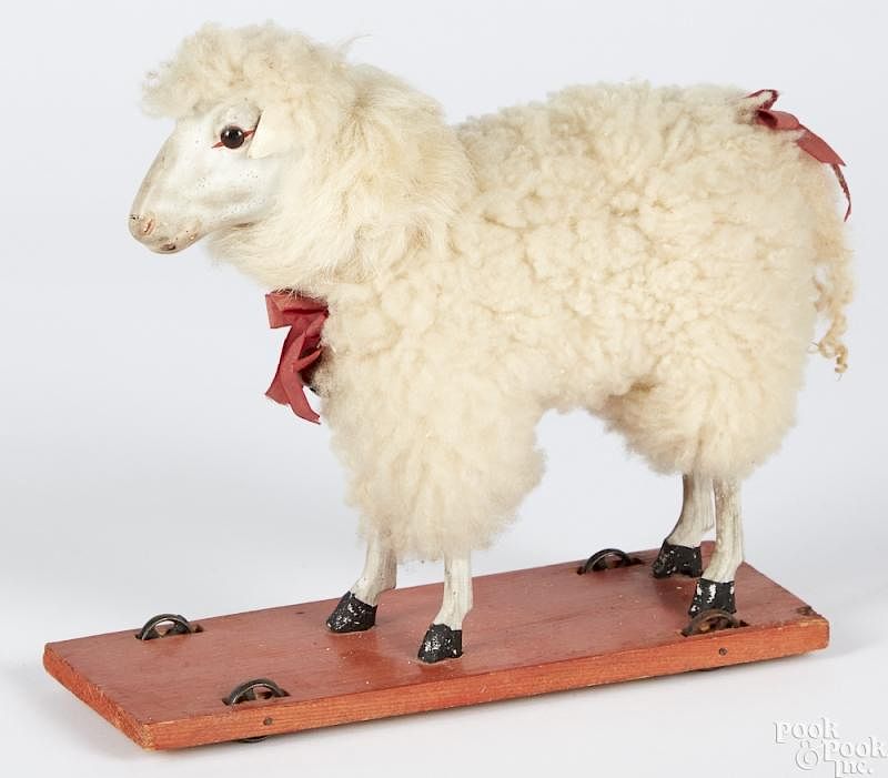 Appraisal: German stick leg sheep pull toy German stick leg sheep