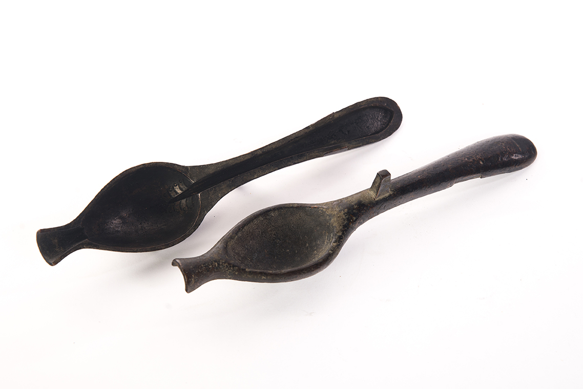 Appraisal: BRONZE TWO-PIECE PEWTER SPOON MOLD American ca Typical pointed handle