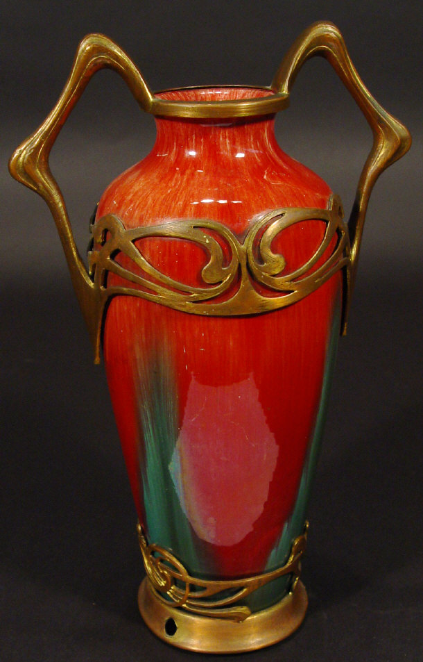 Appraisal: Art Nouveau pottery vase decorated with a red and green