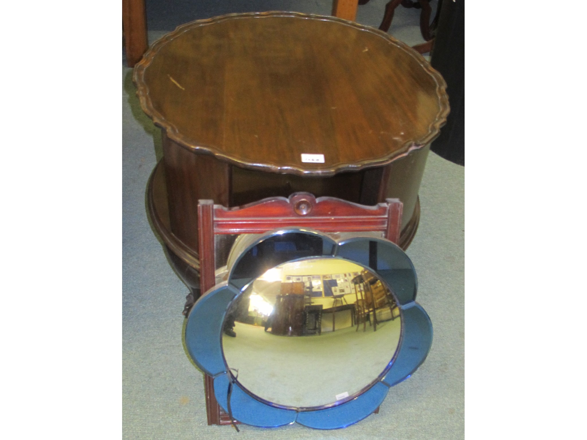 Appraisal: Mahogany circular table and two wall mirrors