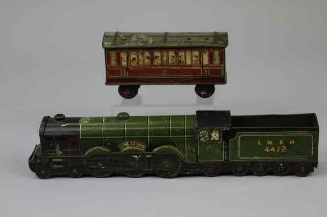 Appraisal: FLYING SCOTSMAN LOCOMOTIVE AND BISCUIT TIN W Crawford Sons England