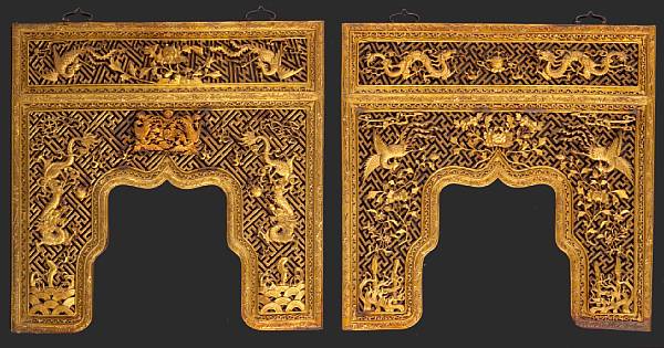 Appraisal: A pair of red and gilt-painted wood hanging panels th