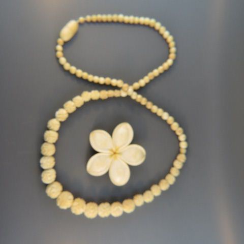 Appraisal: pcs Carved Ivory Jewelry Mings Hawaii flower pin and a