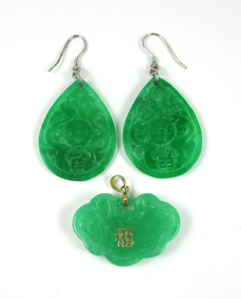 Appraisal: CHINESE JADE AND FOURTEEN KARAT GOLD PENDANT the pendant with