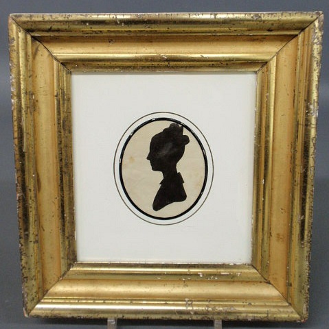 Appraisal: American School oval clipped silhouette of a woman c x