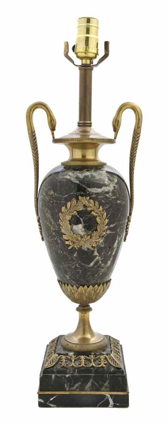 Appraisal: An Empire Style Gilt Bronze Mounted Urn of baluster handled