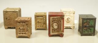 Appraisal: Cast Iron Vintage Safe Banks Includes children Cast Iron Vintage