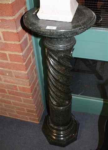 Appraisal: A VICTORIAN SERPENTINE MARBLE COLUMN of wrythen carved form on